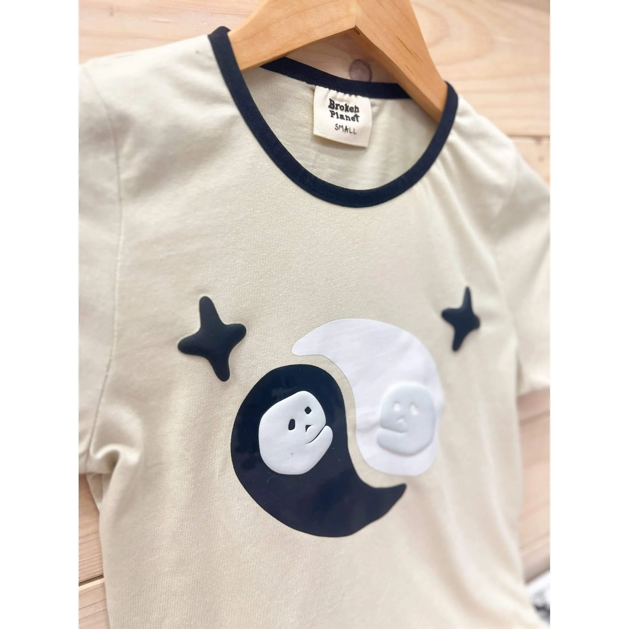 Broken Planet Market Find Your Balance Baby Tee Bone White